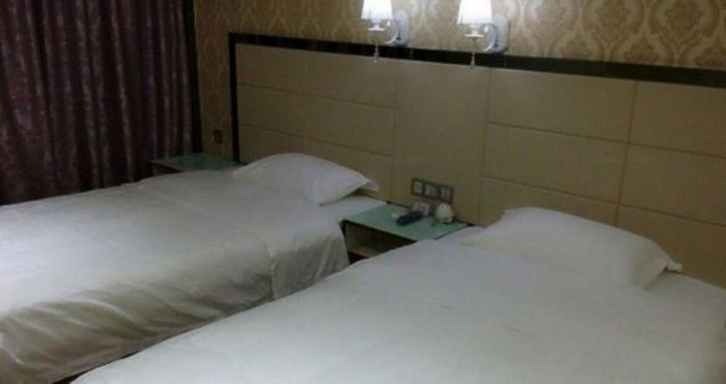 Aoqi Business Hotel Kuangcsou Kültér fotó